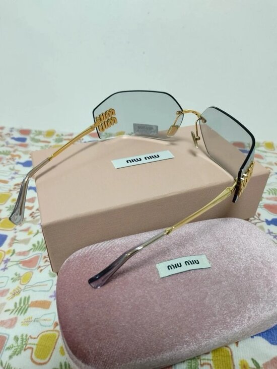 ✨ Miu Miu Rimless Grey Sunglasses with Gold Logo Detail main image 5